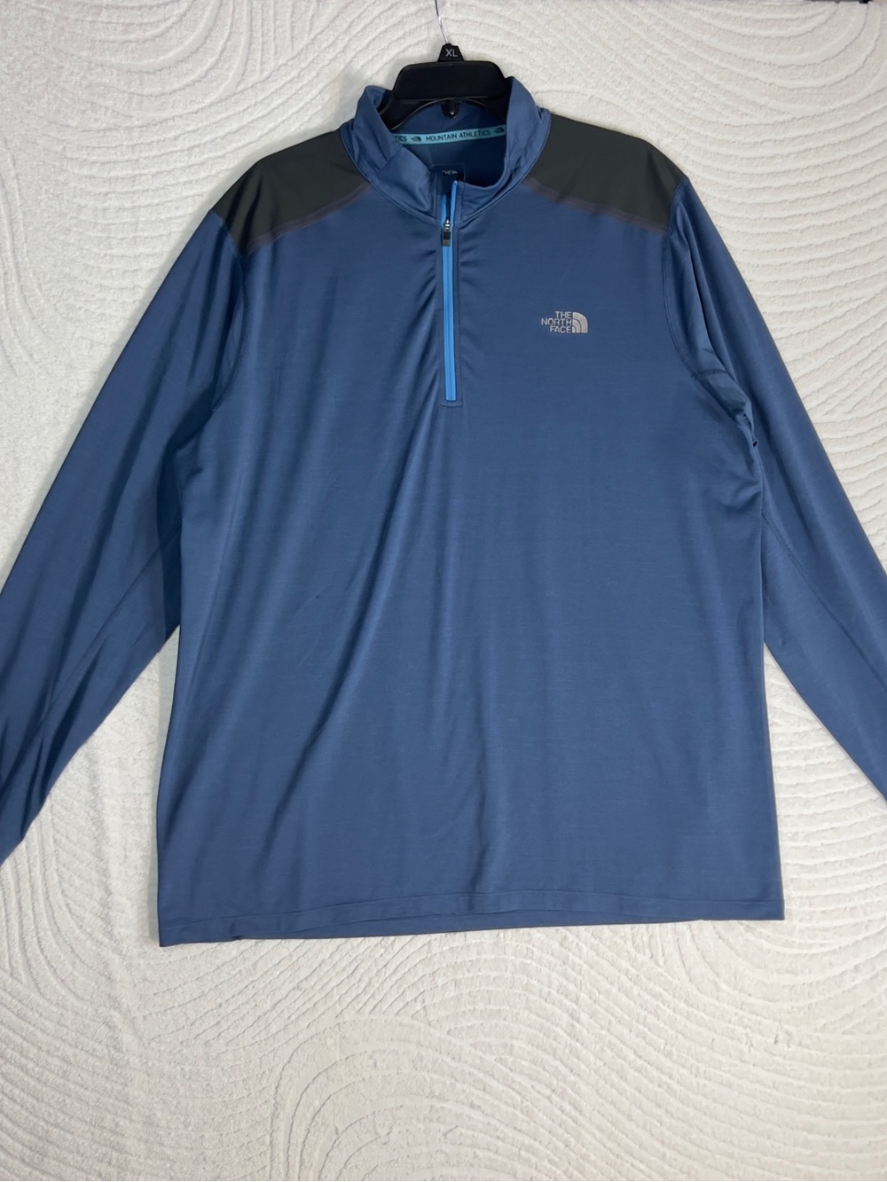 The North Face Men's Blue Half-Zip Performance Jacket with Dark Shoulder Panels